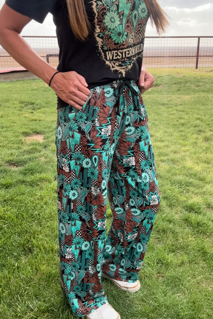 Tattoos in Turquoise Pants