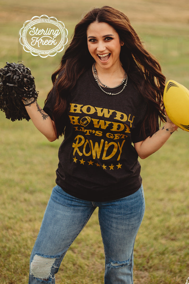 Who's ready for some football!!! This shirt is so perfect for the season!!! We wanted something to really stick out in the stands, so we gave you this tee! The sparkly gold letters really pop off of this black shirt in the best way possible! The unisex fitting make this shirt great for all shapes and sizes!  MSRP: $ 25+