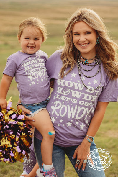 Who's ready for some football!!! This shirt is perfect for the season! We wanted something to really stick out in the stands, so here you go! The white letters really pop off this purple shirt! The unisex fit makes this shirt great for all shapes and sizes!  MSRP: $23+