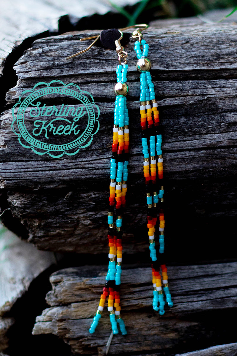 Simple seed bead long tassel earrings with turquoise/yellow/orange/white/black beads. Perfect for a pop of color for any outfit!    length-3.5"  MSRP: $10+
