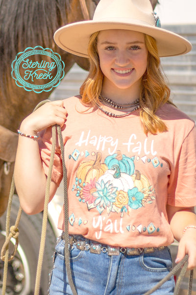 We love fall, the weather, pumpkins, the colors. This tee shirt has everything we love about fall! Bright warm colors, pumpkins, flowers,  and of-course turquoise! Happy Fall from us to YOU!  Model is wearing a Small MSRP: $33+